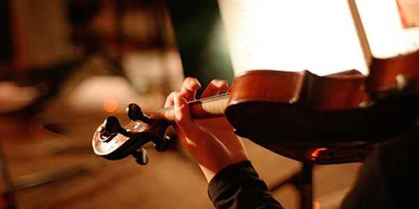 photo of student holding violin